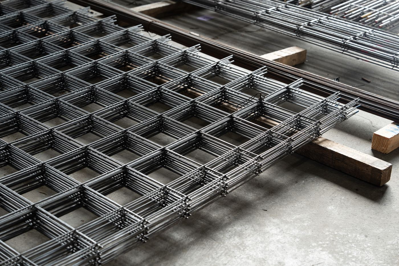 Stacked sheets of reinforcing mesh