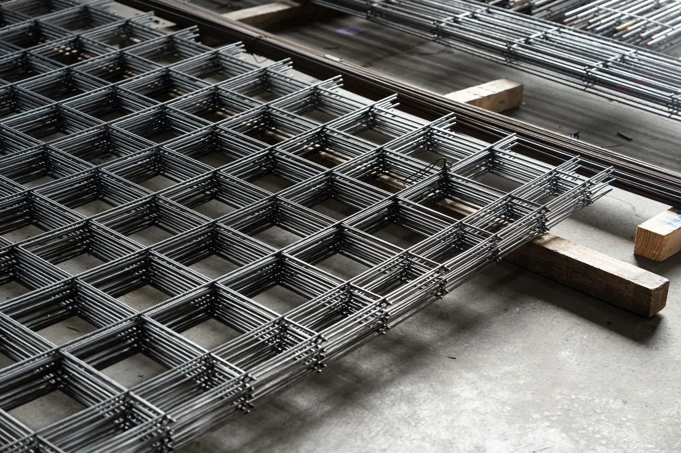 Stacked sheets of reinforcing mesh